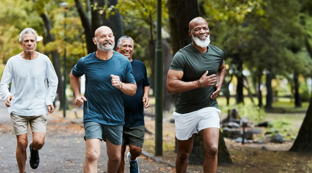 A group of men running in the woods