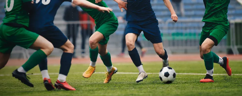 Men playing soccer