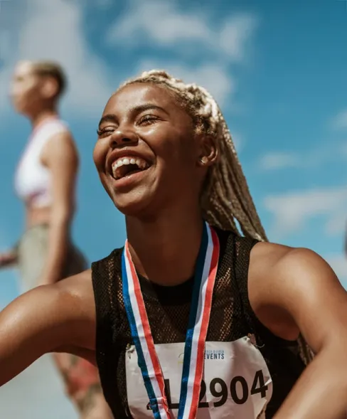 Female athlete with medal