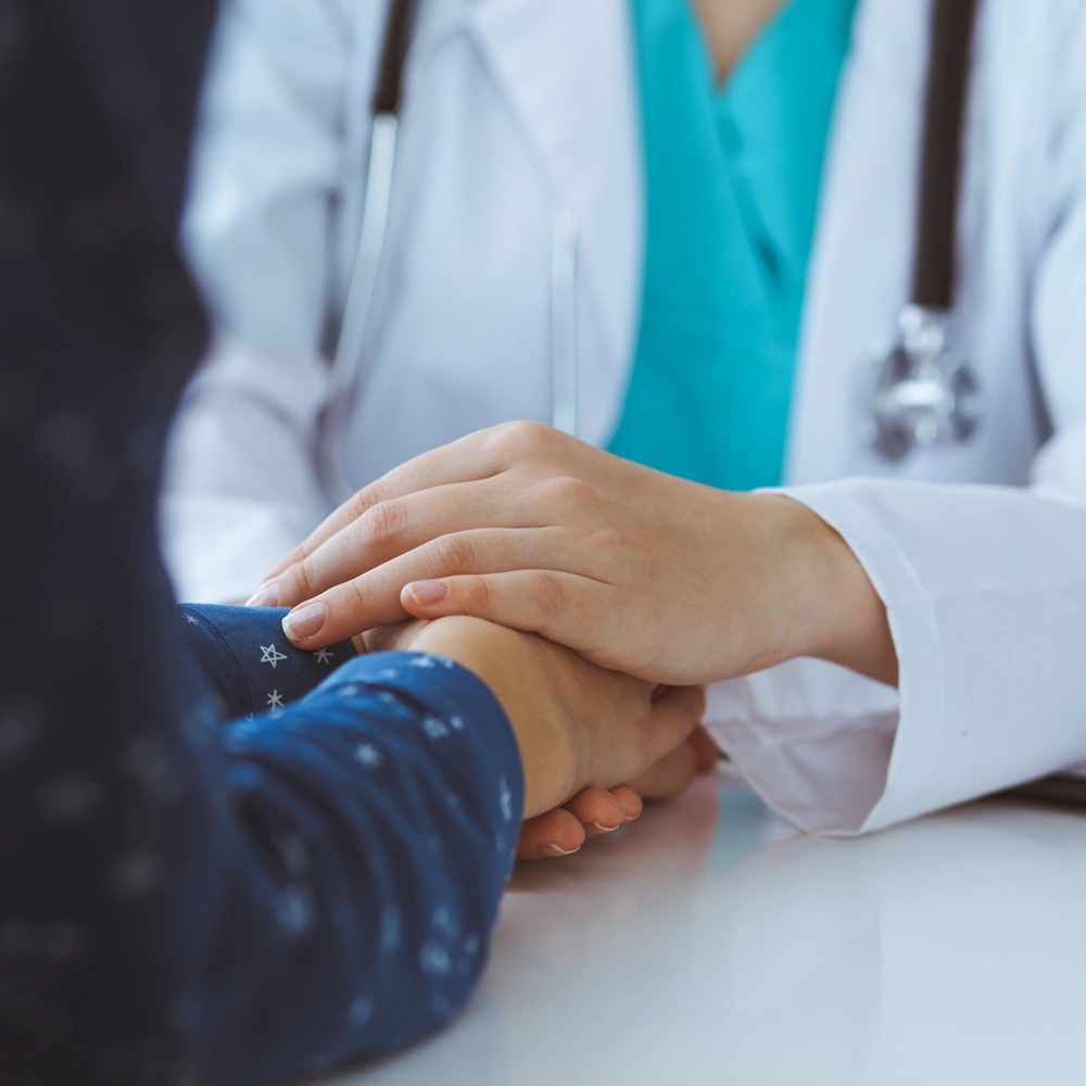 A doctor meeting with their patient